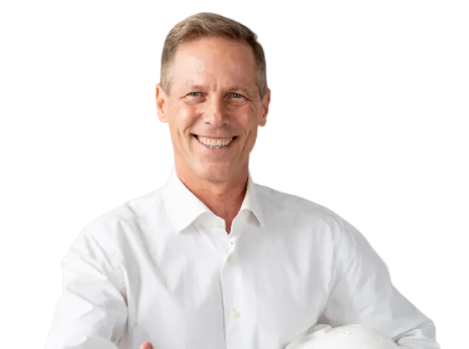 Smiling older professional man in a white shirt, holding a white helmet